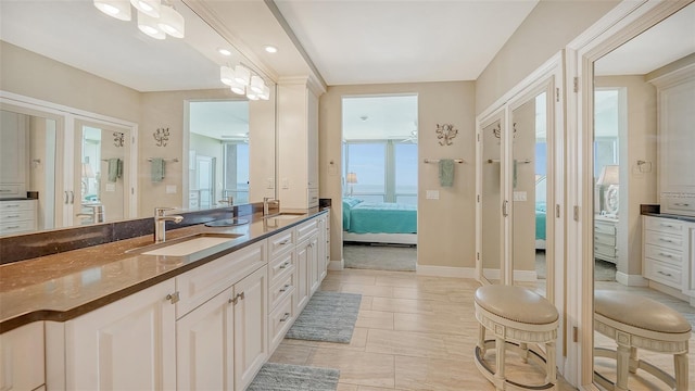 bathroom with vanity and tile patterned flooring