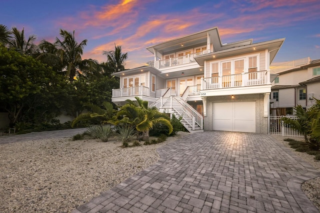 raised beach house with a garage