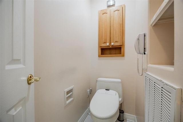 bathroom featuring toilet