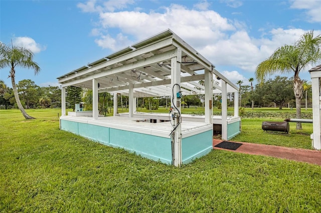 view of pool featuring a gazebo and a yard