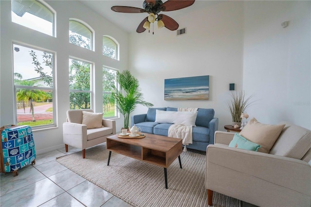 sunroom featuring ceiling fan