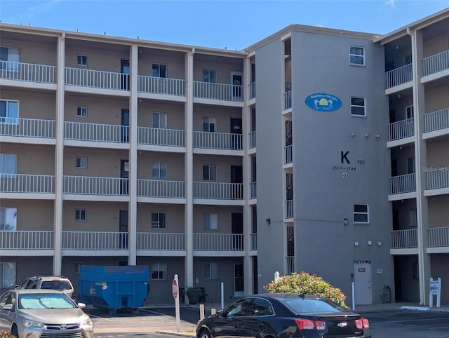 3780 Lake Bayshore Dr Unit K-521, Bradenton, FL 34205 - view of apartment building / complex with uncovered parking