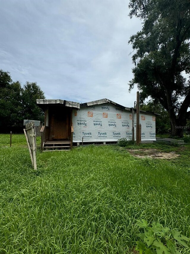 exterior space with a lawn