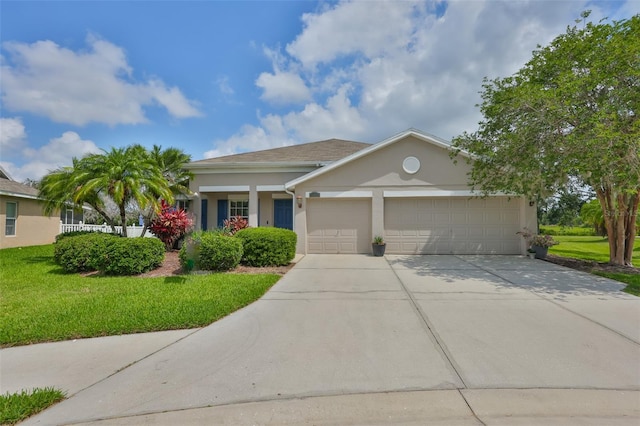 11622 Summit Rock Ct, Parrish, FL 34219 - view of front of property featuring stucco siding, an attached garage, concrete driveway, and a front lawn