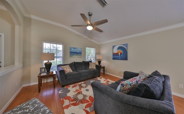 11622 Summit Rock Ct, Parrish, FL 34219 - living room featuring wood finished floors, lofted ceiling, crown molding, ceiling fan, and baseboards
