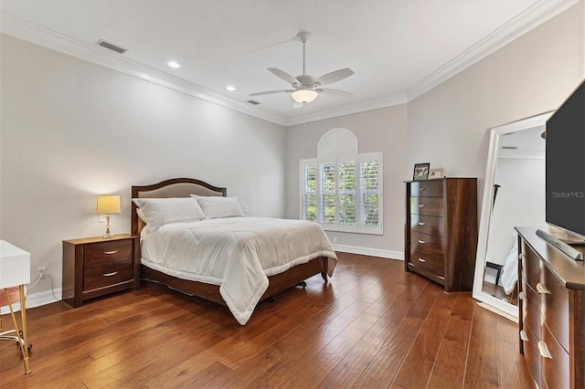 bedroom with crown molding, ceiling fan, and dark hardwood / wood-style flooring