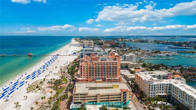 bird's eye view featuring a water view and a view of the beach