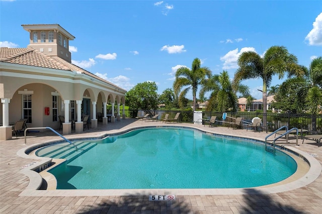 view of swimming pool featuring a patio