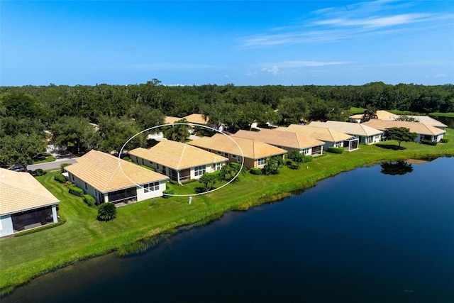 drone / aerial view with a water view