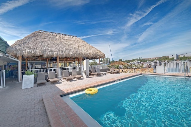 view of pool featuring a patio and a gazebo