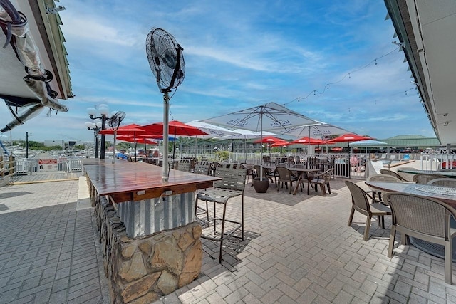 view of patio / terrace with an outdoor bar