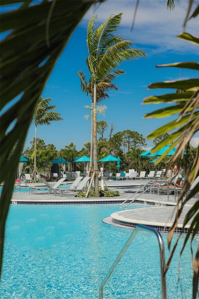 community pool with a patio