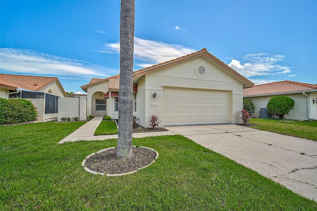 view of front facade featuring a garage, a tile roof, driveway, stucco siding, and a front yard