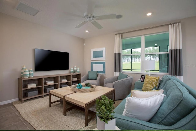 tiled living room with ceiling fan