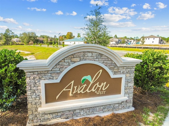 view of community sign