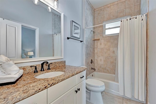 full bathroom with vanity, tile patterned flooring, toilet, and shower / bath combo