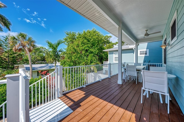 wooden deck with ceiling fan