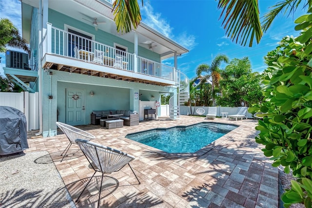 view of pool with a patio area and outdoor lounge area