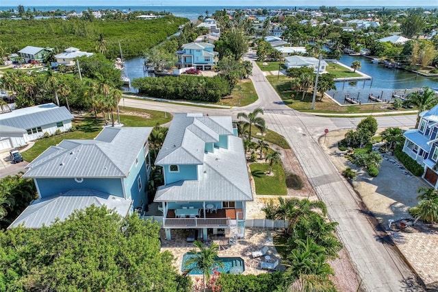 bird's eye view with a water view