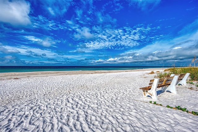 property view of water featuring a beach view