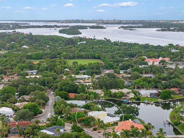 birds eye view of property featuring a water view