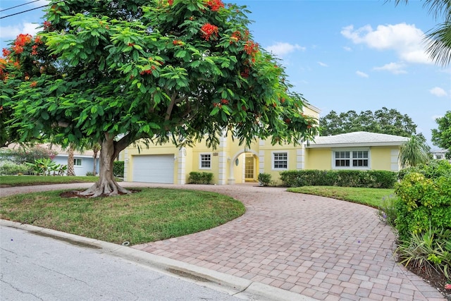 view of front of home with a front lawn