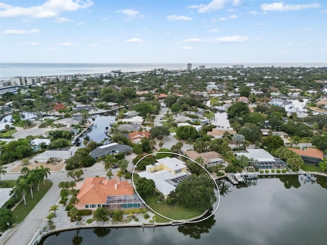 drone / aerial view with a water view