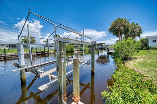 dock area featuring a water view