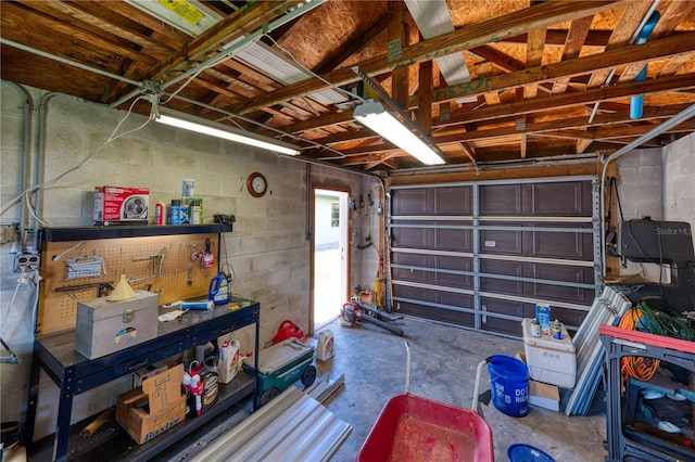 garage with a workshop area