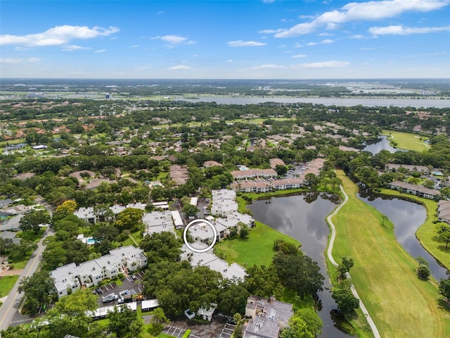 drone / aerial view with a water view