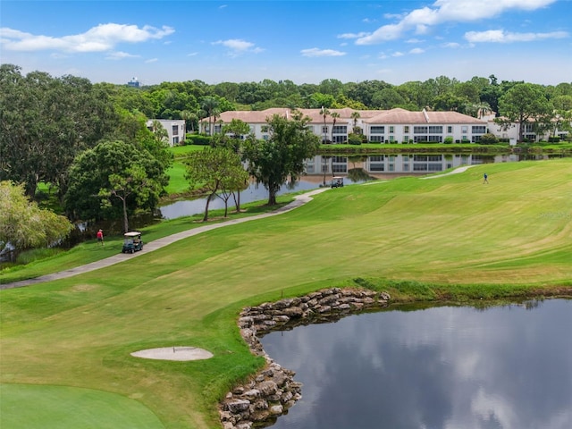 surrounding community featuring a water view