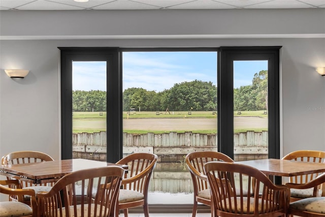 dining room featuring a paneled ceiling