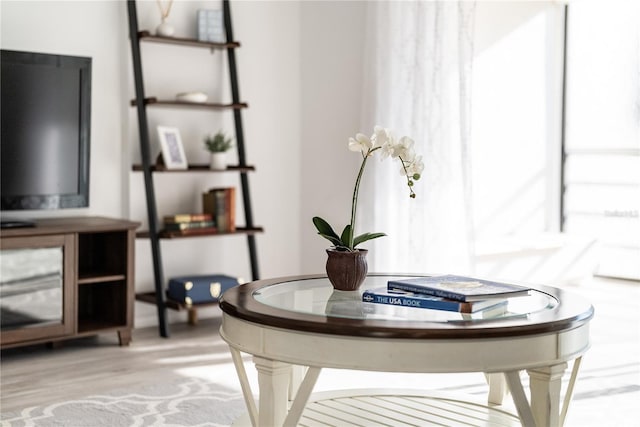 details with hardwood / wood-style flooring