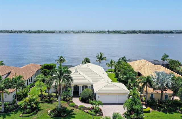 drone / aerial view with a water view