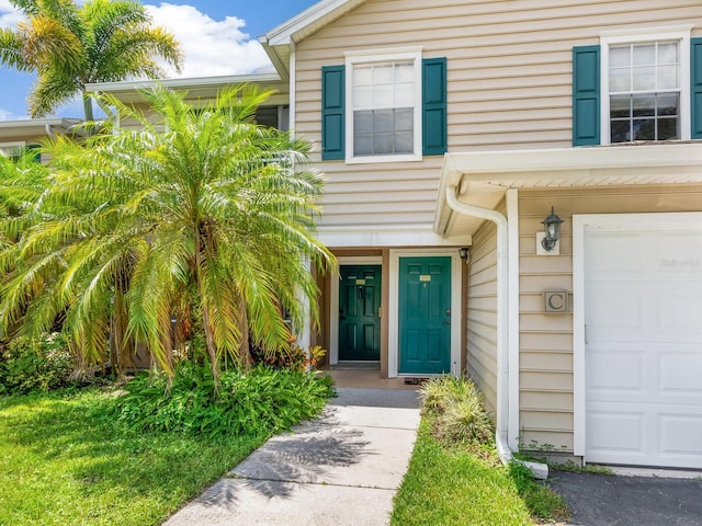 entrance to property featuring a garage