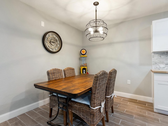 dining area featuring a chandelier