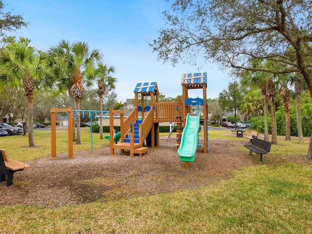 view of play area featuring a lawn