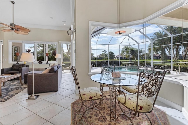 sunroom with a ceiling fan