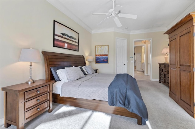 bedroom with ornamental molding, light colored carpet, baseboards, and a ceiling fan