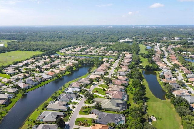 birds eye view of property featuring a residential view and a water view