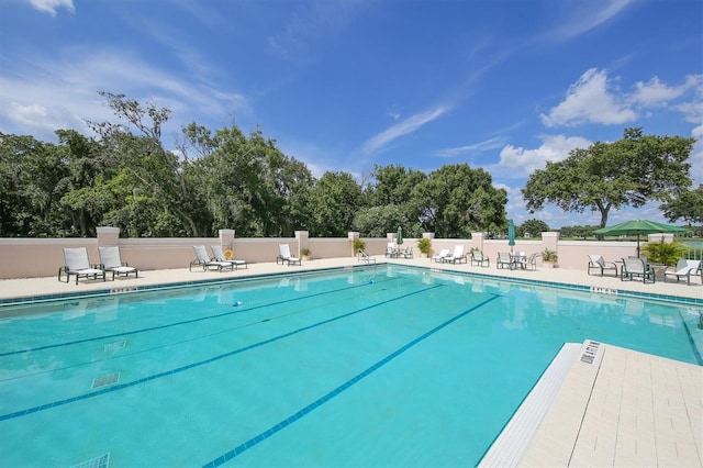 pool featuring fence