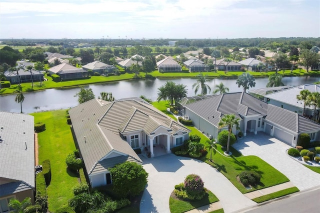 drone / aerial view with a water view