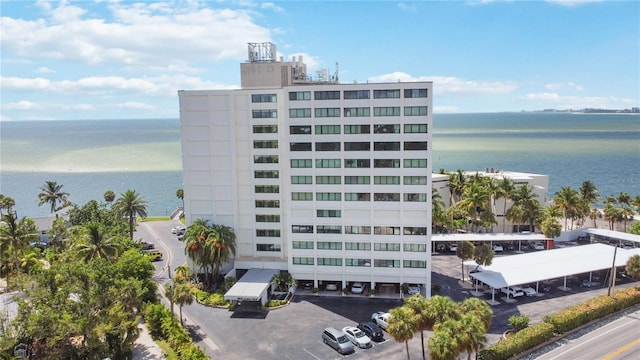 view of building exterior with a water view