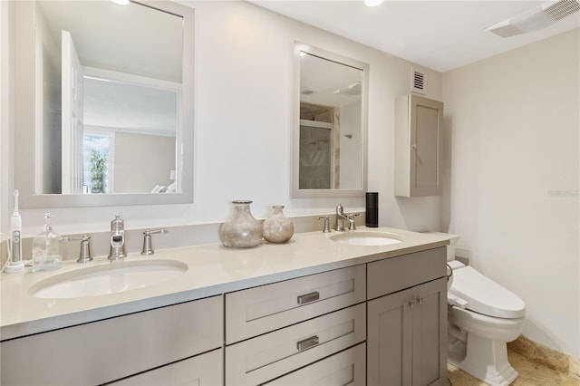 bathroom with a shower, toilet, and vanity