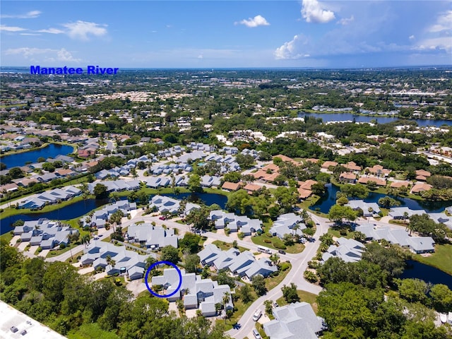 aerial view featuring a residential view and a water view