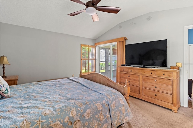 carpeted bedroom featuring vaulted ceiling and ceiling fan