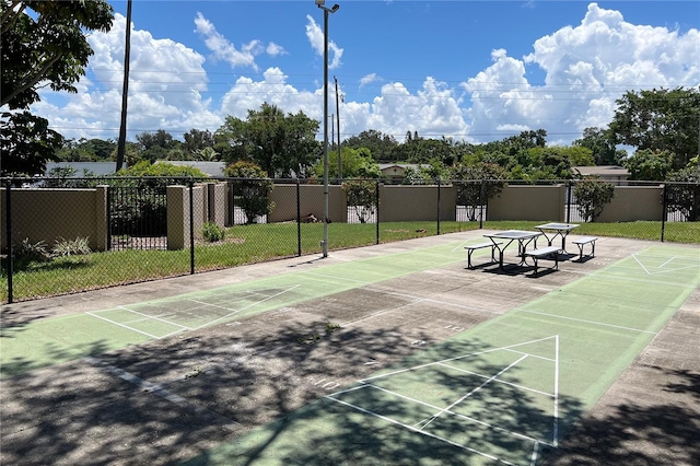 view of home's community featuring a lawn