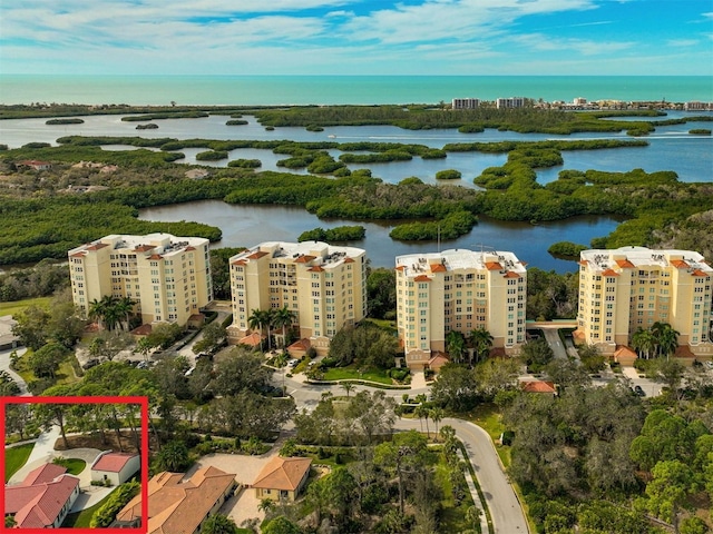 drone / aerial view featuring a water view