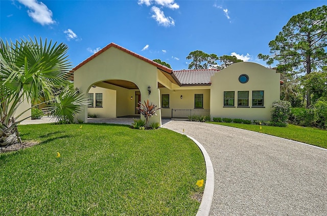 view of front of home with a front lawn