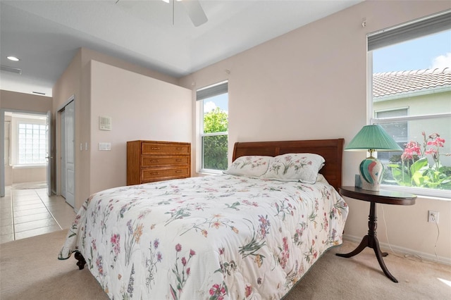 5249 Far Oak Cir, Sarasota, FL 34238 - bedroom with carpet floors, ceiling fan, baseboards, and a closet